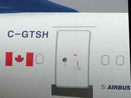 08:23 - ID and rear door on Air Transat C-GTSH