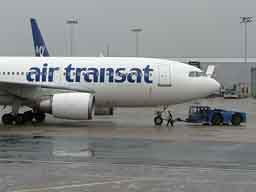 08:23 - Tow truck on pushback of Air Transat C-GTSH