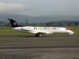 27 March 2002 (0811) bmi British Midland G-RJXK taxiing from runway 23 to Stand 16 following an early morning arrival at Glasgow