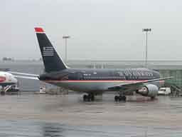 08:42 - N651US taxiing onto stand 28 on arrival from PHL